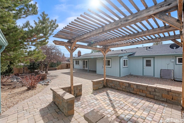 view of patio featuring a fenced backyard and a pergola