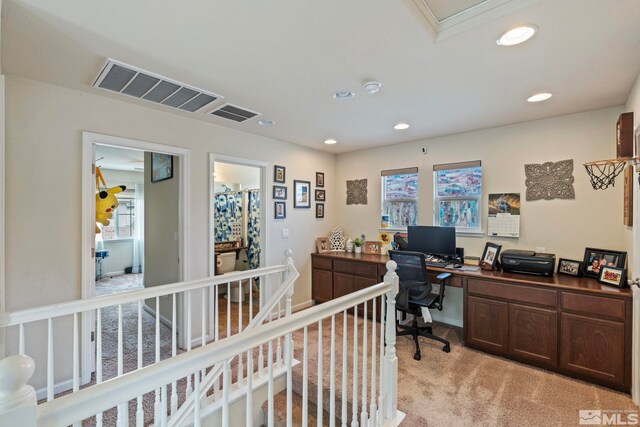 office space featuring recessed lighting, visible vents, and light colored carpet