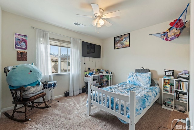 bedroom featuring a ceiling fan, baseboards, visible vents, and carpet floors