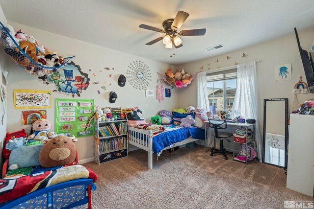 bedroom with a ceiling fan, carpet, and visible vents
