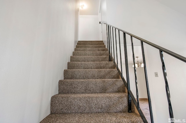 stairway with carpet floors