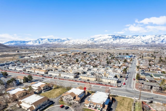 drone / aerial view with a residential view and a mountain view