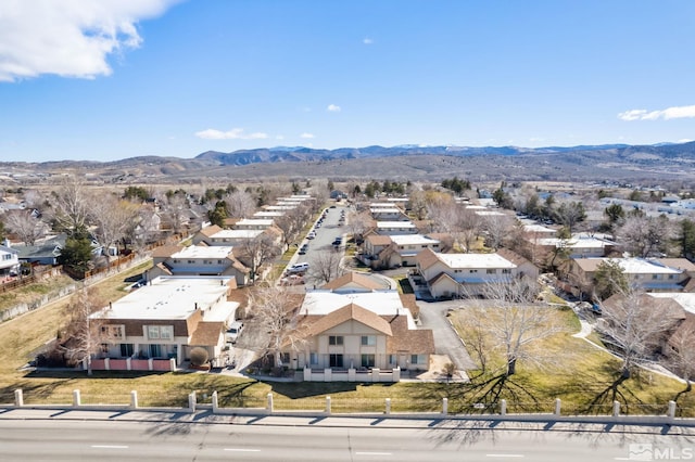 drone / aerial view with a mountain view and a residential view