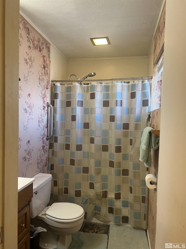 bathroom featuring vanity, a shower with curtain, ornamental molding, a textured ceiling, and toilet