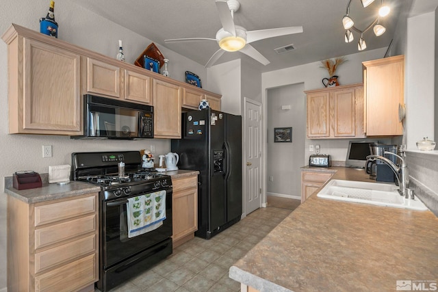 kitchen featuring a sink, visible vents, black appliances, and light brown cabinets