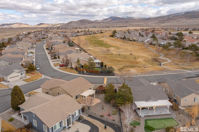 drone / aerial view featuring a mountain view and a residential view