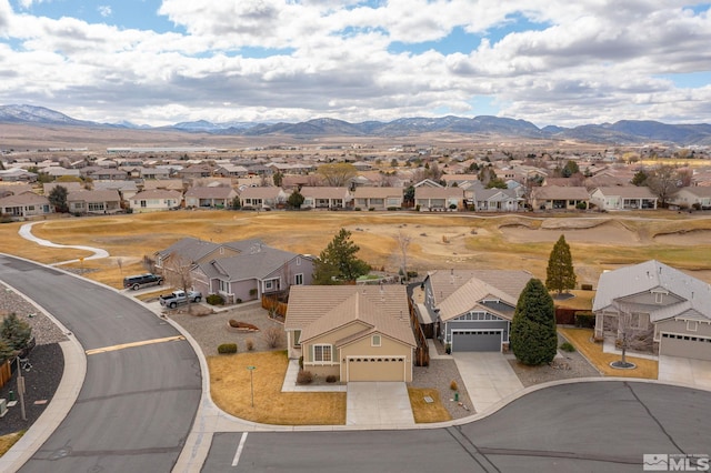 aerial view with a mountain view and a residential view