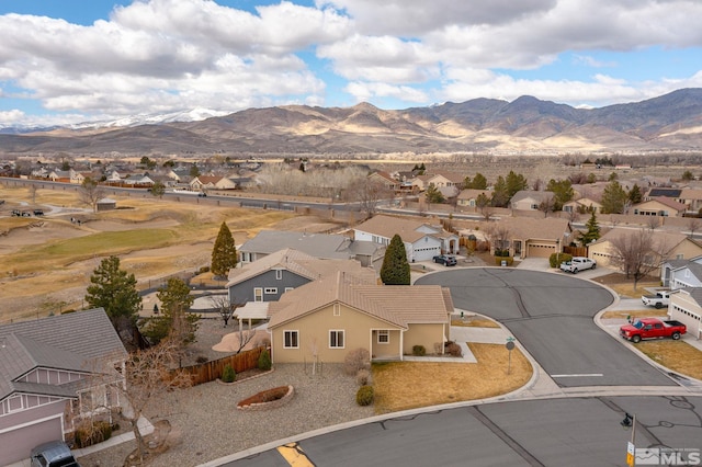 bird's eye view featuring a mountain view and a residential view