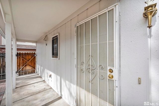 property entrance with a gate and fence