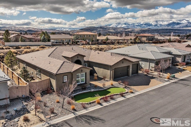 bird's eye view with a mountain view and a residential view