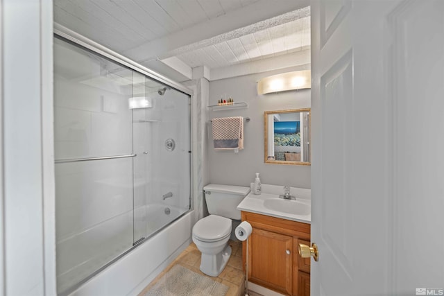 full bath with beamed ceiling, toilet, tile patterned floors, combined bath / shower with glass door, and vanity