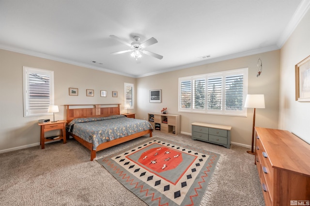 bedroom with visible vents, ornamental molding, baseboards, and carpet floors