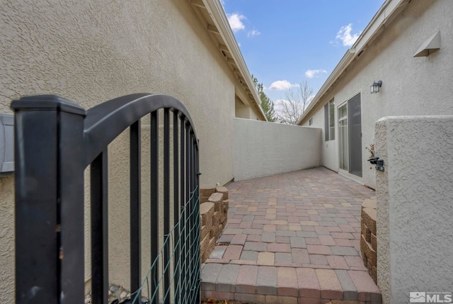 view of patio featuring fence