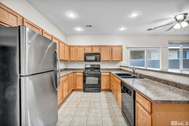 kitchen with visible vents, light tile patterned floors, recessed lighting, black appliances, and a sink