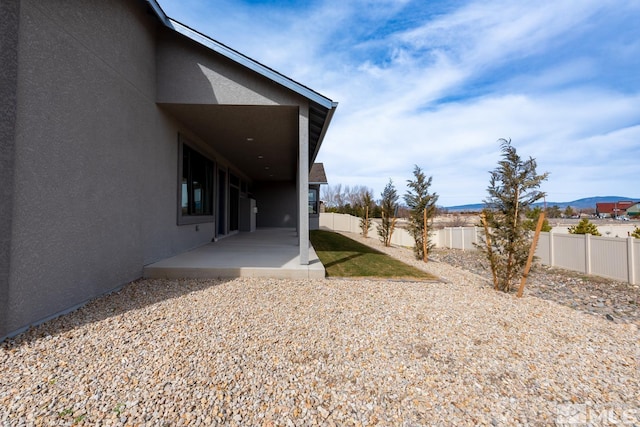 view of yard featuring a patio and a fenced backyard