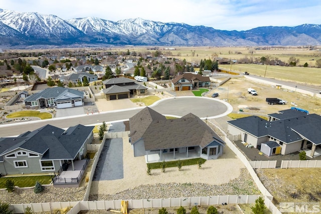 drone / aerial view with a mountain view and a residential view