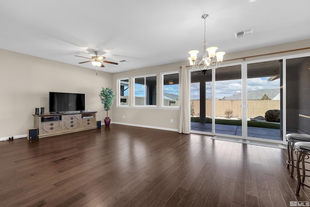 living room with plenty of natural light, baseboards, and wood finished floors