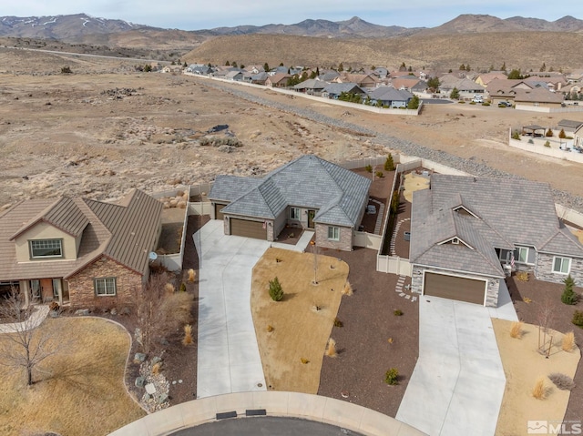 bird's eye view featuring a mountain view and a residential view