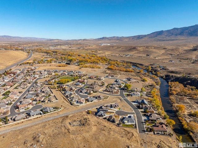 aerial view with a residential view and a mountain view