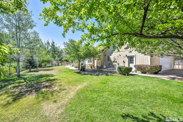 view of yard with a patio area and fence