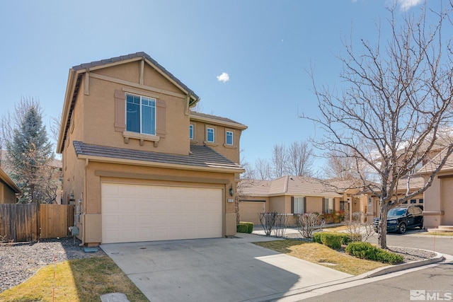 traditional home with stucco siding, driveway, fence, a garage, and a tiled roof