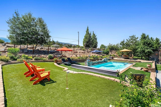 pool featuring a patio area and fence