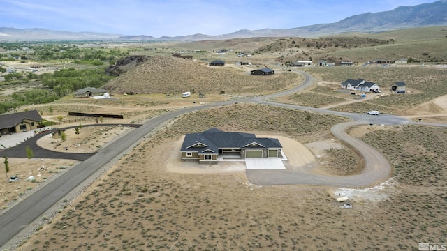 aerial view featuring a mountain view and a rural view