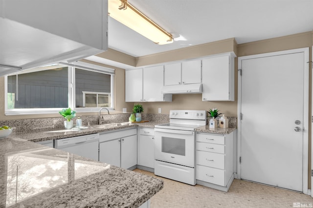 kitchen featuring under cabinet range hood, white appliances, white cabinetry, and a sink