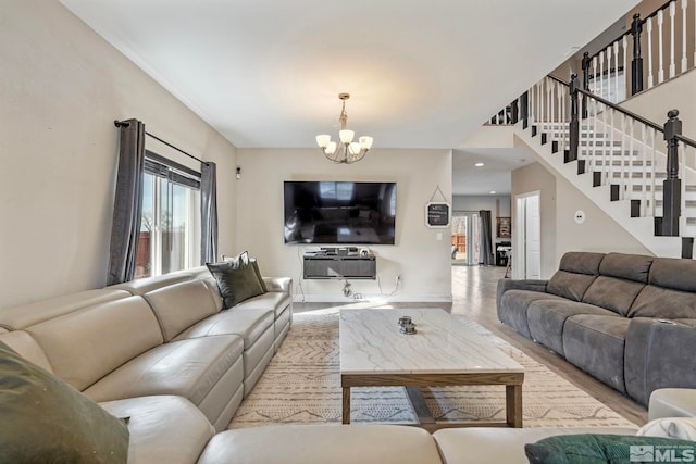 living area featuring baseboards, stairway, recessed lighting, an inviting chandelier, and wood finished floors