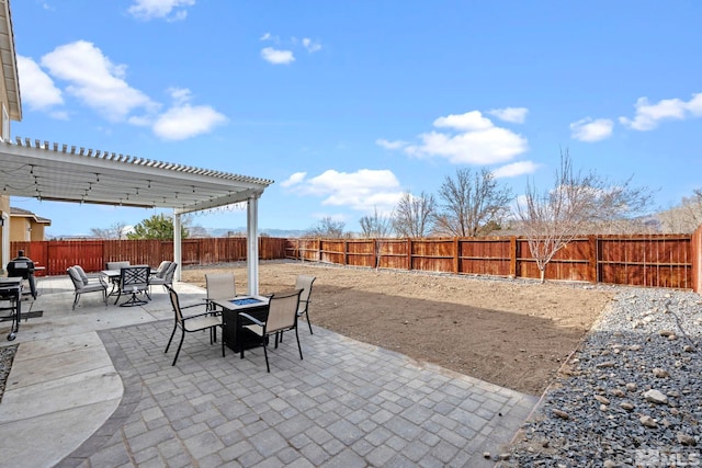 view of patio with a fenced backyard and a pergola