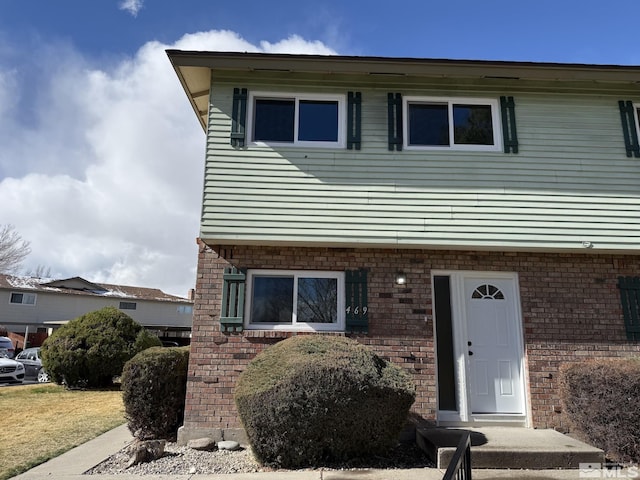 multi unit property with brick siding