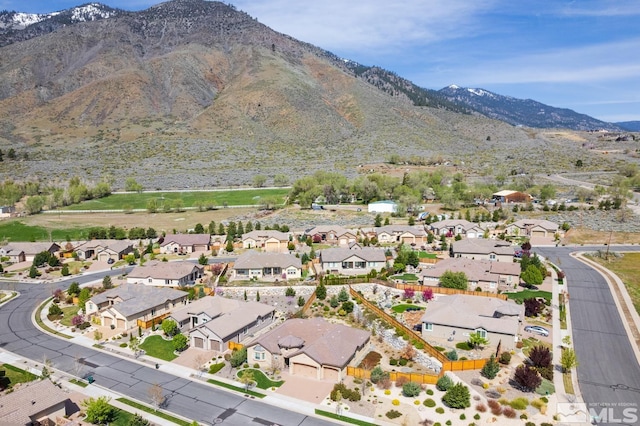 bird's eye view featuring a mountain view and a residential view