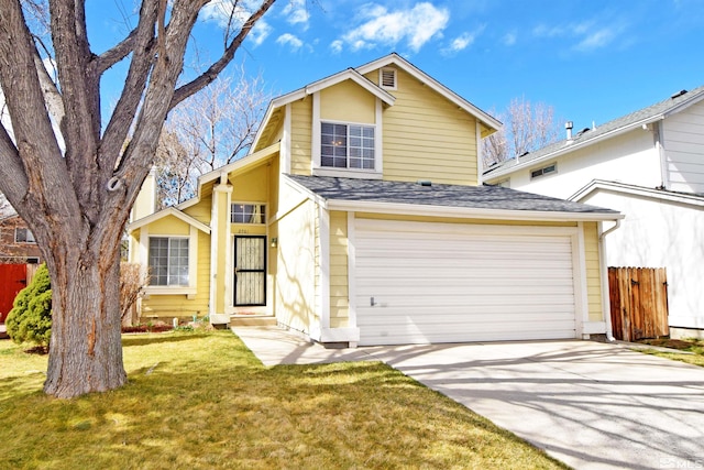 traditional-style home featuring a front lawn, fence, concrete driveway, an attached garage, and a shingled roof