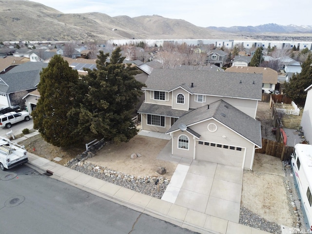 aerial view featuring a residential view and a mountain view