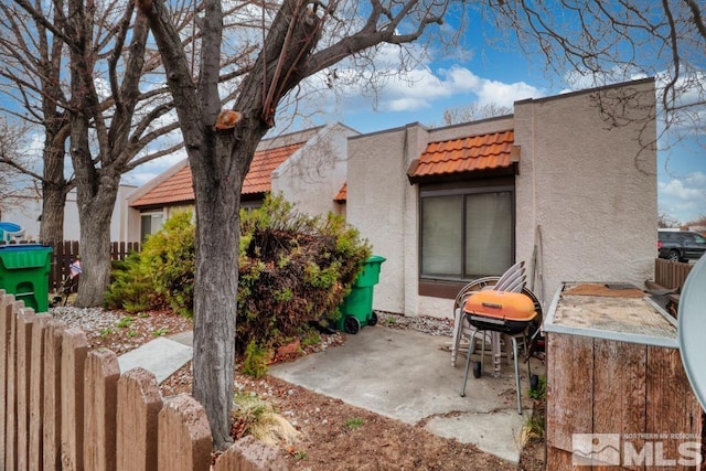 view of patio with fence