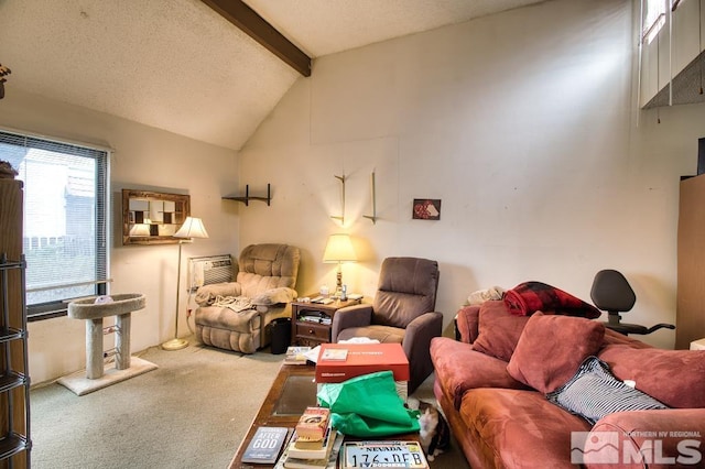 living room featuring lofted ceiling with beams, carpet, and a textured ceiling