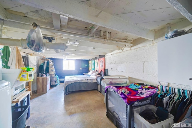 bedroom featuring concrete flooring