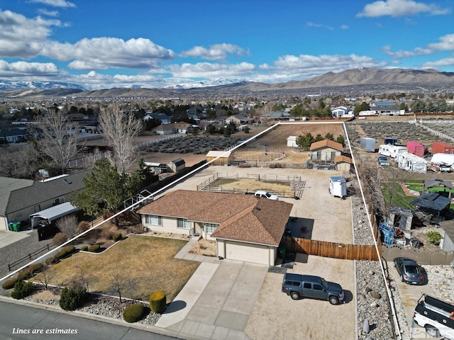 aerial view with a mountain view and a residential view