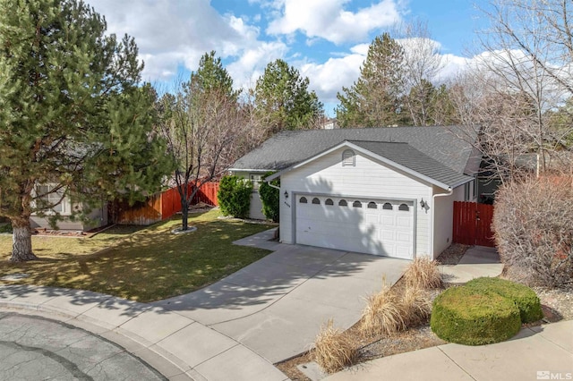 ranch-style home featuring a shingled roof, fence, a front yard, a garage, and driveway