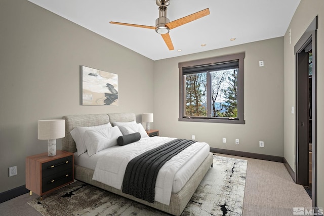 bedroom featuring baseboards, carpet floors, and ceiling fan