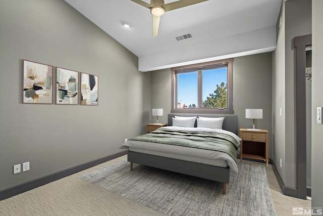 bedroom with visible vents, baseboards, a ceiling fan, and vaulted ceiling