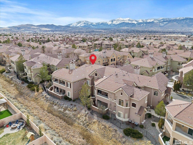 aerial view with a mountain view and a residential view