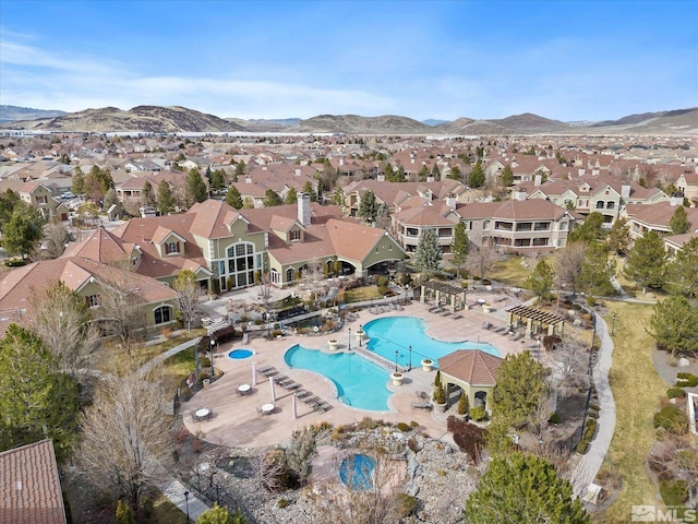 bird's eye view with a residential view and a mountain view