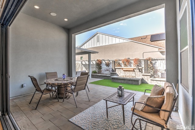 view of patio featuring outdoor dining space