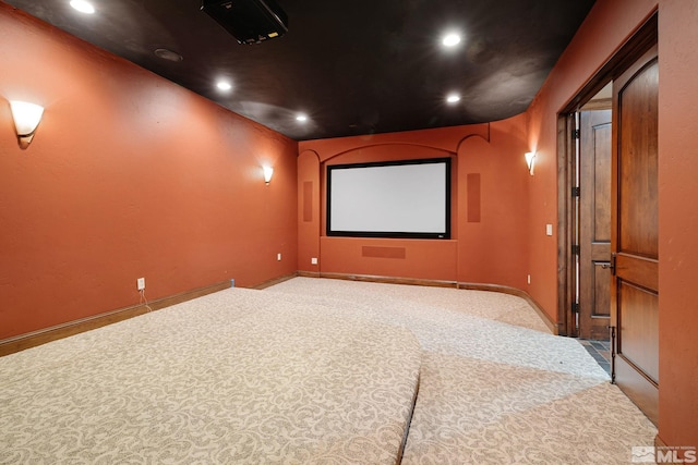 home theater room featuring carpet, recessed lighting, and baseboards