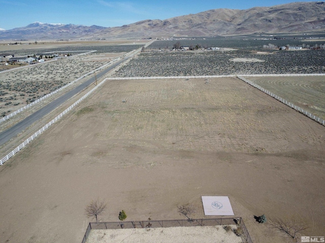 aerial view featuring a rural view and a mountain view