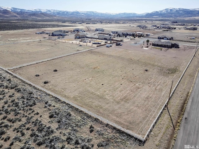 birds eye view of property featuring a rural view and a mountain view