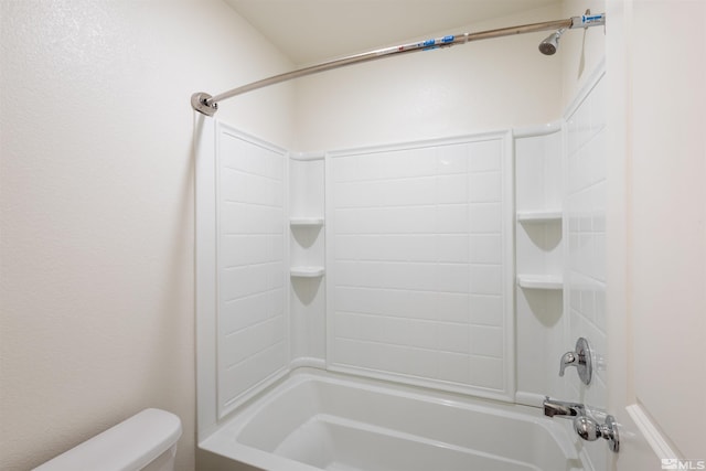 full bathroom featuring toilet and tub / shower combination