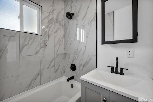 bathroom with vanity and  shower combination