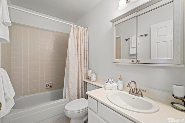 bathroom with vanity, toilet, and shower / bath combo